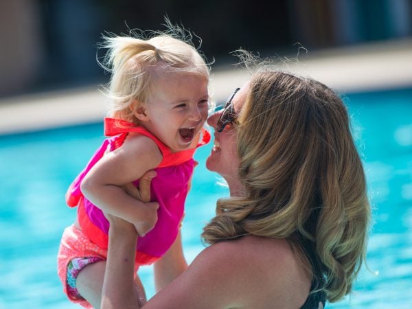 a person holding a baby