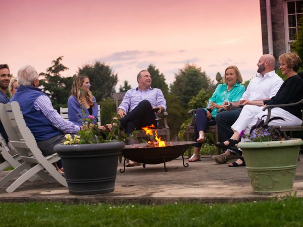 a group of people sitting outside