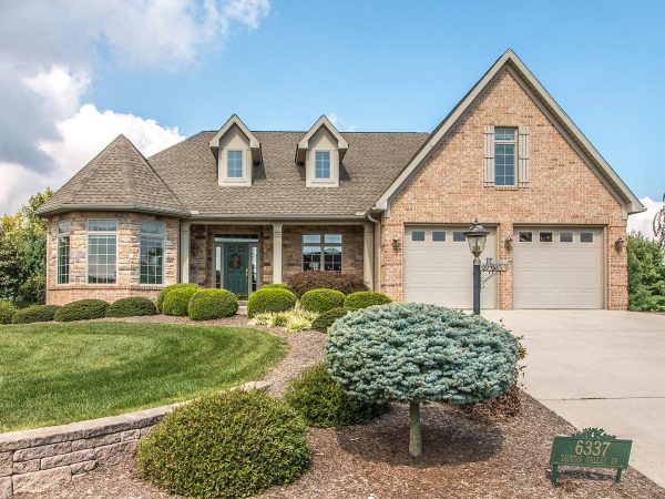 a large house with a driveway