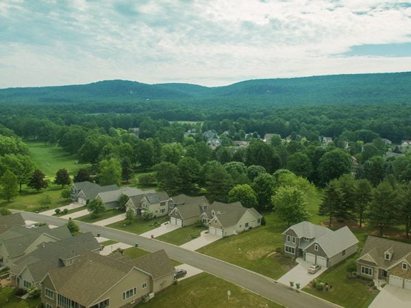 a landscape with houses and trees