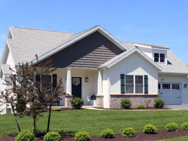 a house with a large front yard with Southfork Ranch in the background
