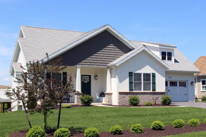 a house with a large front yard with Southfork Ranch in the background
